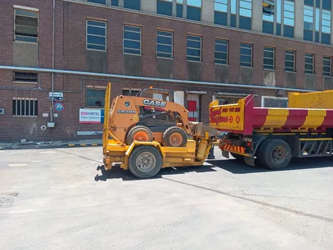 Construction support vehicles and equipment on site